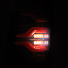 Load image into Gallery viewer, AlphaRex 05-15 Toyota Tacoma LUXX LED Taillights Blk/Red w/Activ Light/Seq Signal 680070 *Discontinued