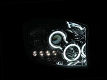 Load image into Gallery viewer, Anzo 2006-2008 Dodge Ram 1500 Projector Headlights w/ Halo Chrome (CCFL)