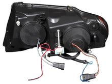 Load image into Gallery viewer, Anzo 1999-2004 Jeep Grand Cherokee Projector Headlights w/ Halo Black