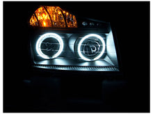 Load image into Gallery viewer, Anzo 2008-2015 Nissan Titan Projector Headlights w/ Halo Black (CCFL)
