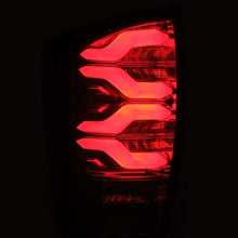 Load image into Gallery viewer, AlphaRex 16-21 Toyota Tacoma LUXX LED Taillights Blk/Red w/Activ Light/Seq Signal 680000 *Discontinued