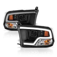 Load image into Gallery viewer, Anzo Dodge Ram 09-18 Projector Plank Style Headlight w/Halo Black Clear