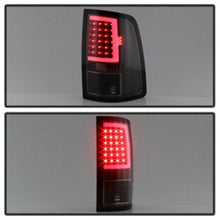 Load image into Gallery viewer, SPYDER xTune 13-18 Dodge Ram 1500 LED Tail Lights - Black (ALT-ON-DRAM13V2-LBLED-BK) 9041013
