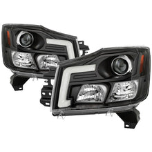 Load image into Gallery viewer, Spyder 04-15 Nissan Titan / 04-07 Nissan Armada V2 Projector Headlights - Black PRO-YD-NTI04-DRL-BK 5085504