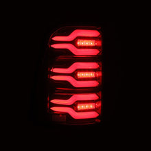 Load image into Gallery viewer, AlphaRex 19-21 Dodge Ram 1500 Luxx-Series LED Tail Lights Black/Red w/Activ Light/Seq Signal 640050 *Discontinued