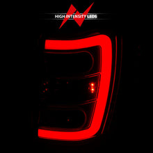 Load image into Gallery viewer, ANZO 1999-2004 Jeep Grand Cherokee LED Tail Lights w/ Light Bar Chrome Housing Red/Clear Lens 311396