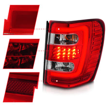 Load image into Gallery viewer, ANZO 1999-2004 Jeep Grand Cherokee LED Tail Lights w/ Light Bar Chrome Housing Red/Clear Lens 311396
