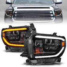 Load image into Gallery viewer, ANZO 2014-2017 Toyota Tundra LED Crystal Headlights w/ Switchback Black Housing w/ DRL 111531