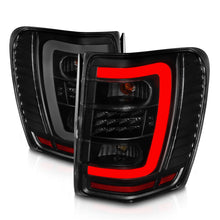 Load image into Gallery viewer, ANZO 1999-2004 Jeep Grand Cherokee LED Tail Lights w/ Light Bar Black Housing Smoke Lens 311395