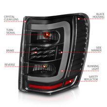 Load image into Gallery viewer, ANZO 1999-2004 Jeep Grand Cherokee LED Tail Lights w/ Light Bar Black Housing Clear Lens 311394