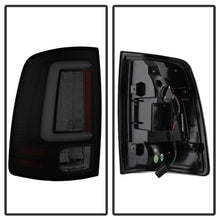 Load image into Gallery viewer, Spyder 13-14 Dodge Ram 1500 Light Bar LED Tail Lights - Black Smoke ALT-YD-DRAM13V2-LED-BSM 5084064
