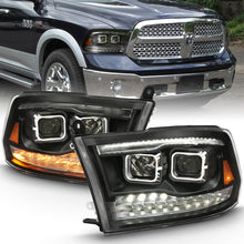 Load image into Gallery viewer, ANZO 2009-2018 Dodge Ram 1500 Projector H.L. Switchback Black Amber 111441