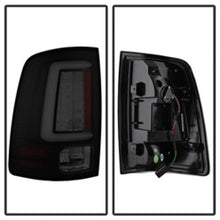 Load image into Gallery viewer, Spyder 13-14 Dodge Ram 1500 Light Bar LED Tail Lights - Black Smoke ALT-YD-DRAM13V2-LED-BSM 5084064