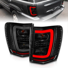Load image into Gallery viewer, ANZO 1999-2004 Jeep Grand Cherokee LED Tail Lights w/ Light Bar Black Housing Smoke Lens 311395