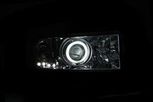 Load image into Gallery viewer, Anzo 1994-2001 Dodge Ram Projector Headlights w/ Halo Chrome