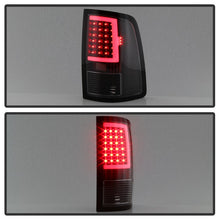 Load image into Gallery viewer, SPYDER xTune 13-18 Dodge Ram 1500 LED Tail Lights - Black (ALT-ON-DRAM13V2-LBLED-BK) 9041013