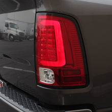 Load image into Gallery viewer, Spyder 09-16 Dodge Ram 1500 Light Bar LED Tail Lights - Red Clear ALT-YD-DRAM09V2-LED-RC 5084040