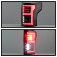 Load image into Gallery viewer, Spyder 15-18 Ford F-150 Light Bar LED Tail Lights (w/Blind Spot) - Black (ALT-YD-FF15015BS-LBLED-BK) 5085313