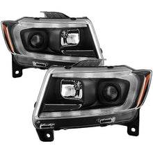 Load image into Gallery viewer, SPYDER 11-13 Jeep Grand Cherokee (Xenon/HID Model Only) Light Bar Projector Headlights - Black 5087737