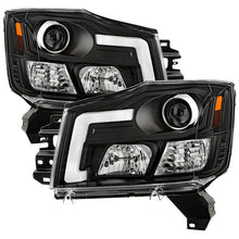 Load image into Gallery viewer, Spyder 04-15 Nissan Titan / 04-07 Nissan Armada V2 Projector Headlights - Black PRO-YD-NTI04-DRL-BK 5085504