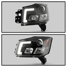 Load image into Gallery viewer, Spyder 04-15 Nissan Titan / 04-07 Nissan Armada V2 Projector Headlights - Black PRO-YD-NTI04-DRL-BK 5085504