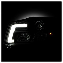 Load image into Gallery viewer, Spyder 04-15 Nissan Titan / 04-07 Nissan Armada V2 Projector Headlights - Black PRO-YD-NTI04-DRL-BK 5085504
