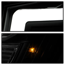 Load image into Gallery viewer, Spyder 04-15 Nissan Titan / 04-07 Nissan Armada V2 Projector Headlights - Black PRO-YD-NTI04-DRL-BK 5085504