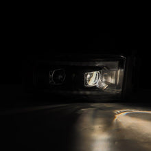 Load image into Gallery viewer, AlphaRex 02-05 Dodge Ram 1500 LUXX LED Proj Headlights Plank Style Black w/Activ Light/Seq Signal 880567 *Discontinued