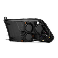 Load image into Gallery viewer, AlphaRex 09-18 Ram 1500/2500 PRO-Series Proj Headlights Black w/Sequential Signal and Top/Middle DRL 880561 *Discontinued