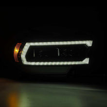 Load image into Gallery viewer, AlphaRex 19-21 Ram 2500 PRO-Series Projector Headlights Plank Style Alpha Black w/Activation Light 880546 *Discontinued