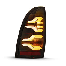 Load image into Gallery viewer, AlphaRex 05-15 Toyota Tacoma LUXX LED Taillights Blk w/Activ Light/Seq Signal 680060 *Discontinued