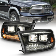 Load image into Gallery viewer, ANZO 2009-2018 Dodge Ram 1500 Projector H.L. Switchback Chrome Amber 111442