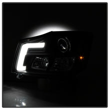 Load image into Gallery viewer, Spyder 04-15 Nissan Titan / 04-07 Nissan Armada V2 Projector Headlights - Black PRO-YD-NTI04-DRL-BK 5085504