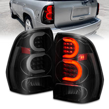 Load image into Gallery viewer, ANZO 2002-2009 Chevrolet Trailblazer LED Tail Lights w/ Light Bar Black Housing Smoke Lens 311372